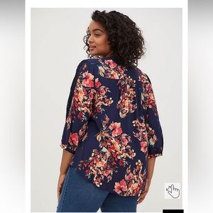 Floral blouse with embroidered sleeves